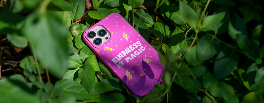 Wildflower Pink EcoBlvd Sequoia Collection Phone Case With Kindness Is Magic Design Surrounded by Green Leaves