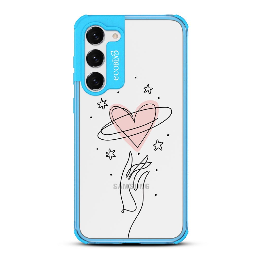 Be Still My Heart - Blue Eco-Friendly Galaxy S23 Case with Hand Reaching For Pink Heart With Stars On A Clear Back