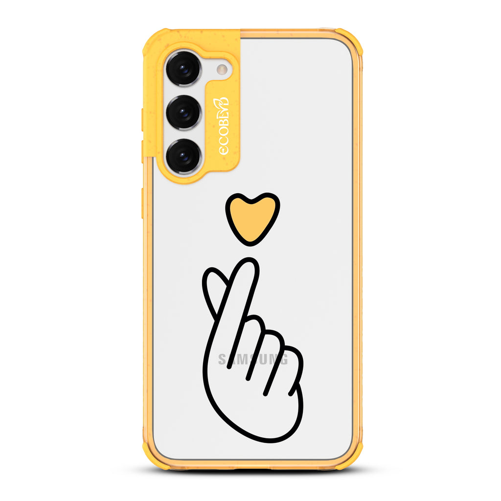 Finger Heart - Yellow Eco-Friendly Galaxy S23 Case With Yellow Heart Above Finger Heart Gesture On A Clear Back