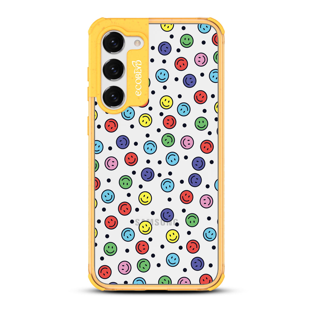 All Smiles - Yellow Eco-Friendly Galaxy S23 Plus Case with Colorful Smiley Faces + Black Dots On A Clear Back