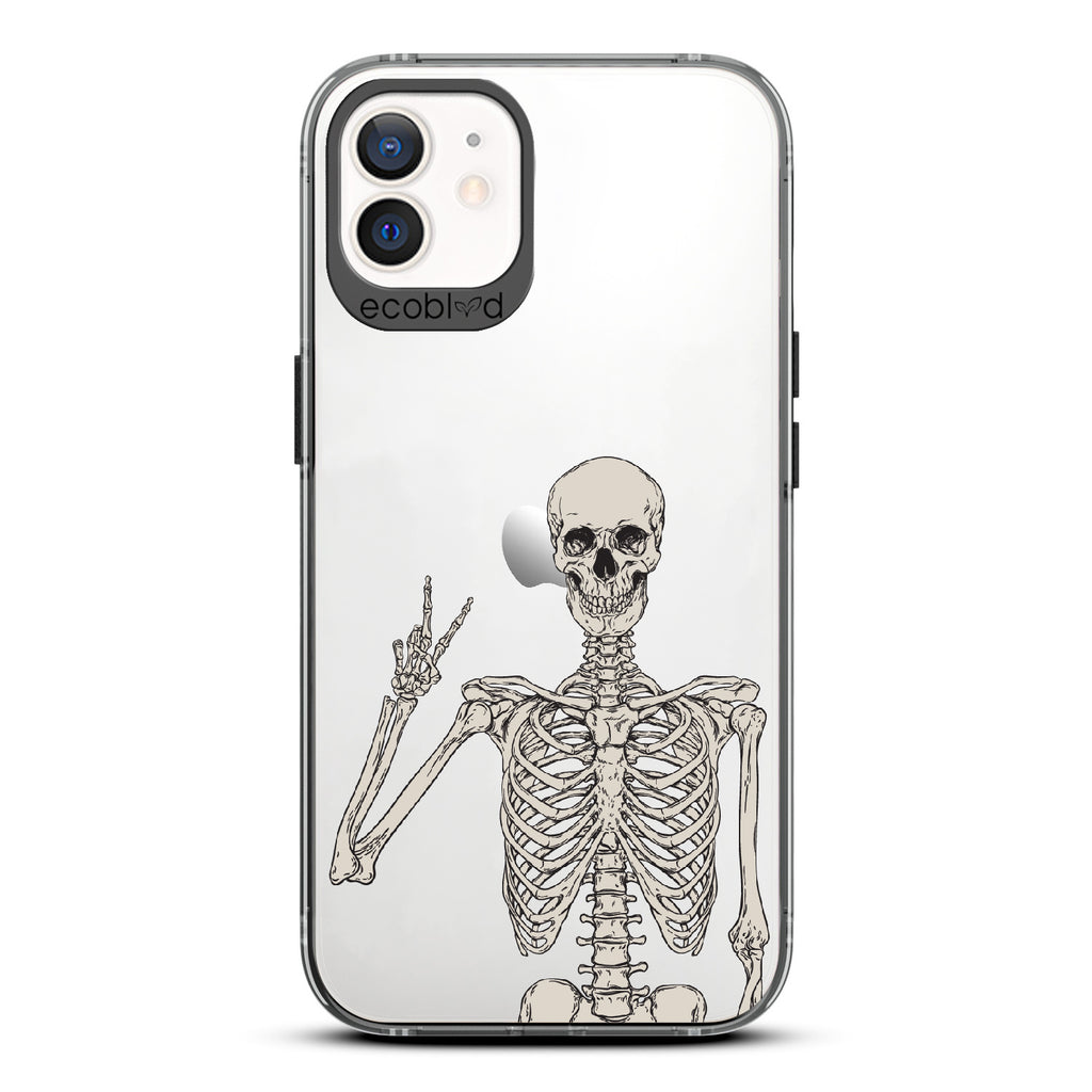 Creepin' It Real - Black Eco-Friendly iPhone 12/12 Pro Case With Skeleton Giving A Peace Sign On A Clear Back