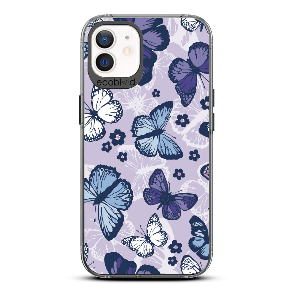 Deja Vu - Black Eco-Friendly iPhone 12/12 Pro Case With Blue, White, Purple Butterflies & Flowers On A Purple / Clear Back