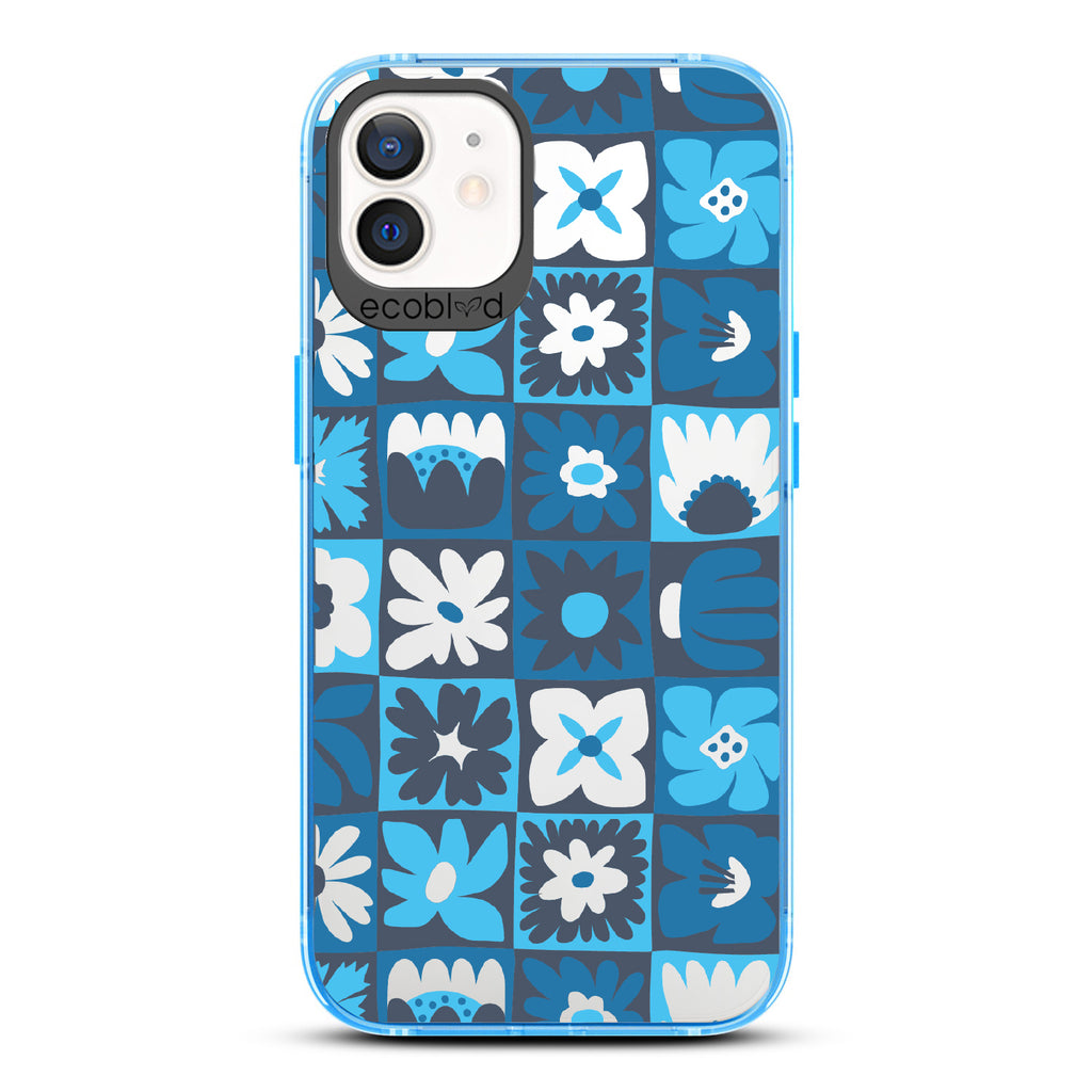 Paradise Blooms - Blue Eco-Friendly iPhone 12/12 Pro Case With Tropical Floral Checker Print On A Clear Back