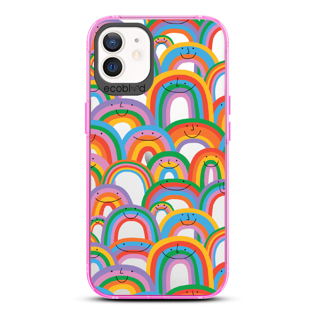 Prideful Smiles - Pink Eco-Friendly iPhone 12/12 Pro Case With Rainbows That Have Smiley Faces On A Clear Back