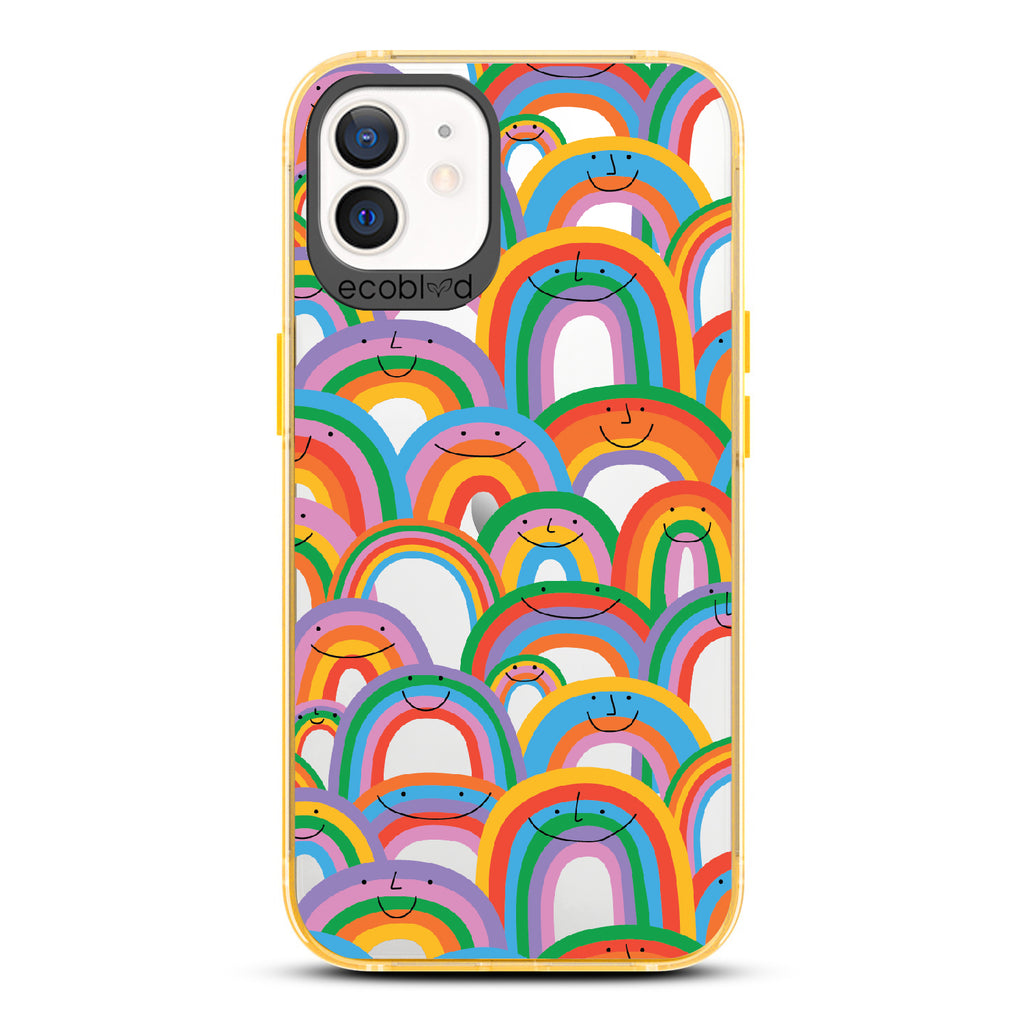 Prideful Smiles - Yellow Eco-Friendly iPhone 12/12 Pro Case With Rainbows That Have Smiley Faces On A Clear Back