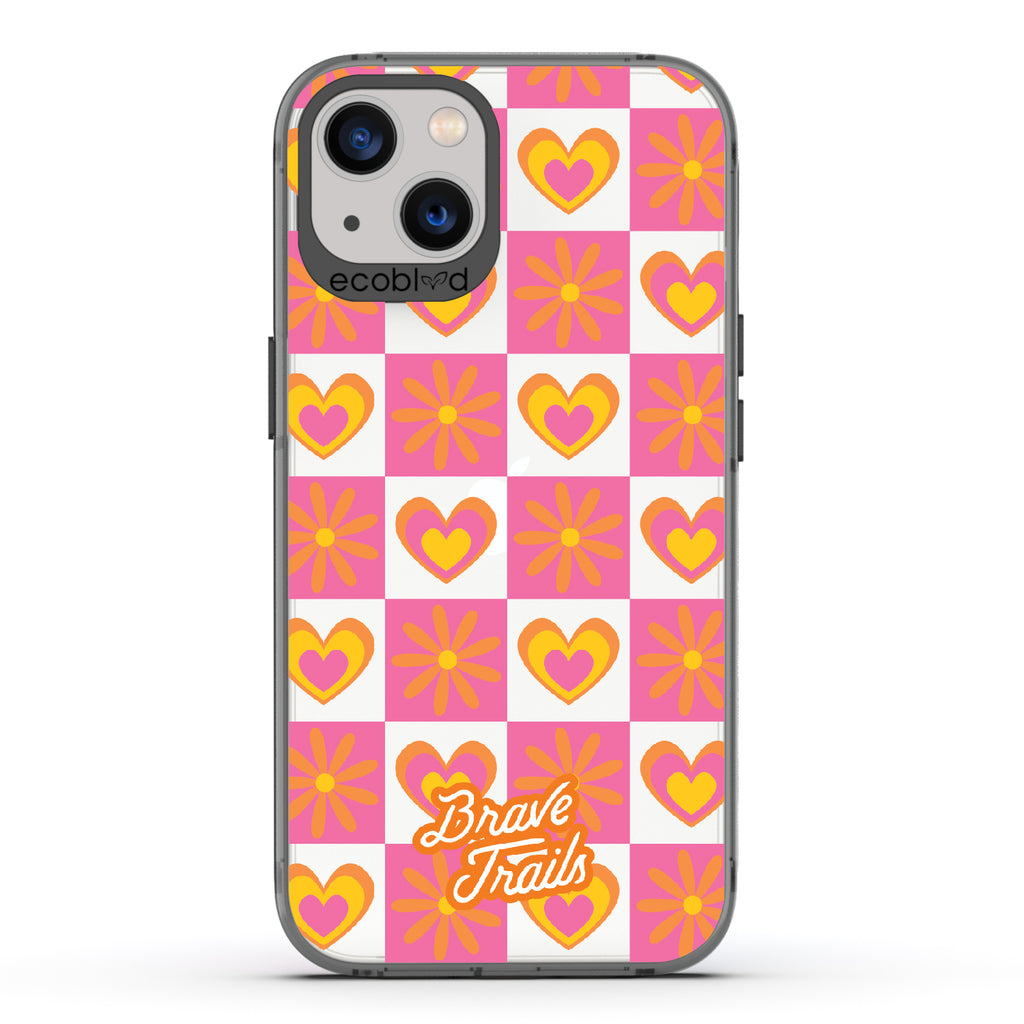 Free Spirit X Brave Trails - Black Eco-Friendly iPhone 13 Case with Pink Checkered Hearts & Flowers On Clear Back