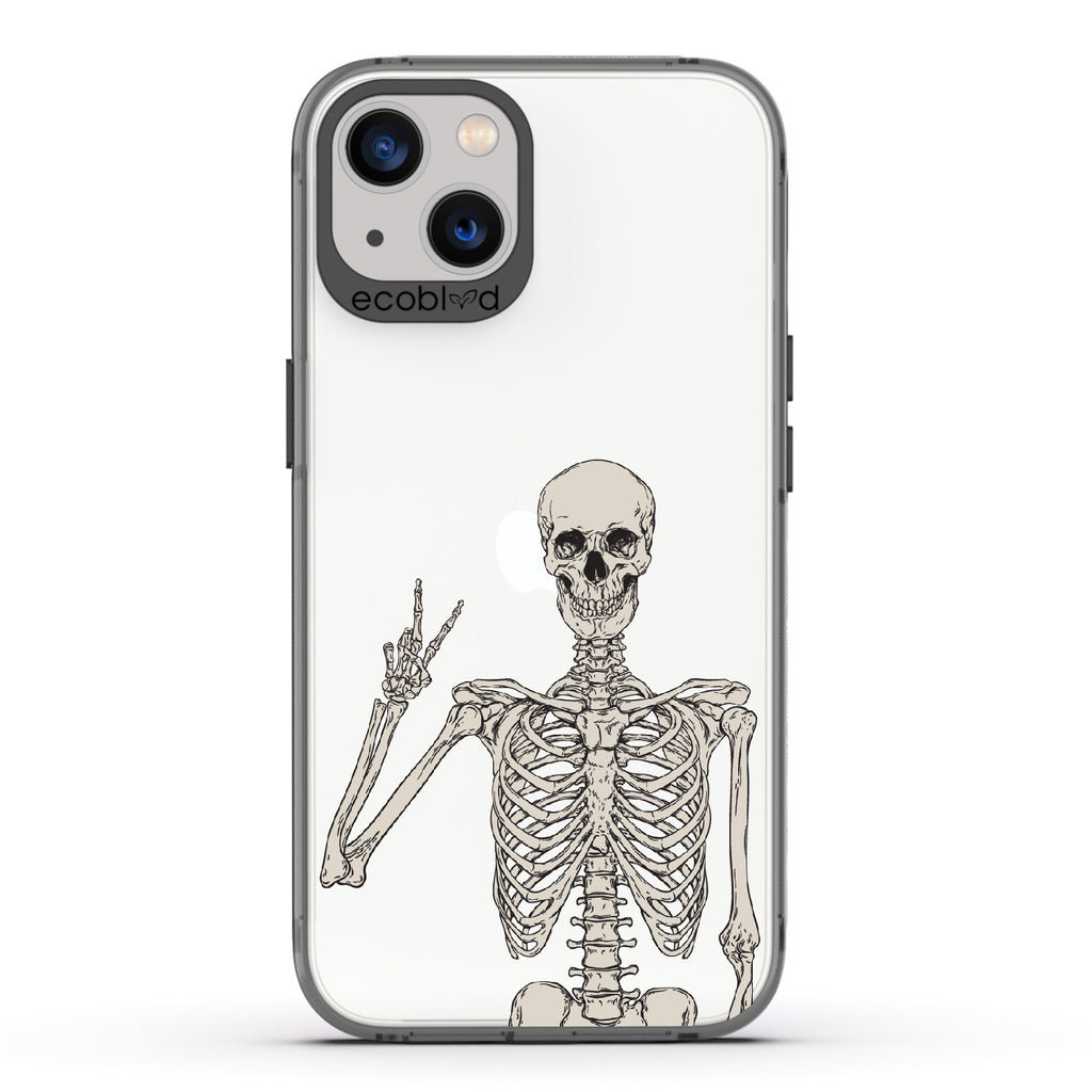 Creepin’ It Real - Black Eco-Friendly iPhone 13 Case With Skeleton Giving A Peace Sign On A Clear Back