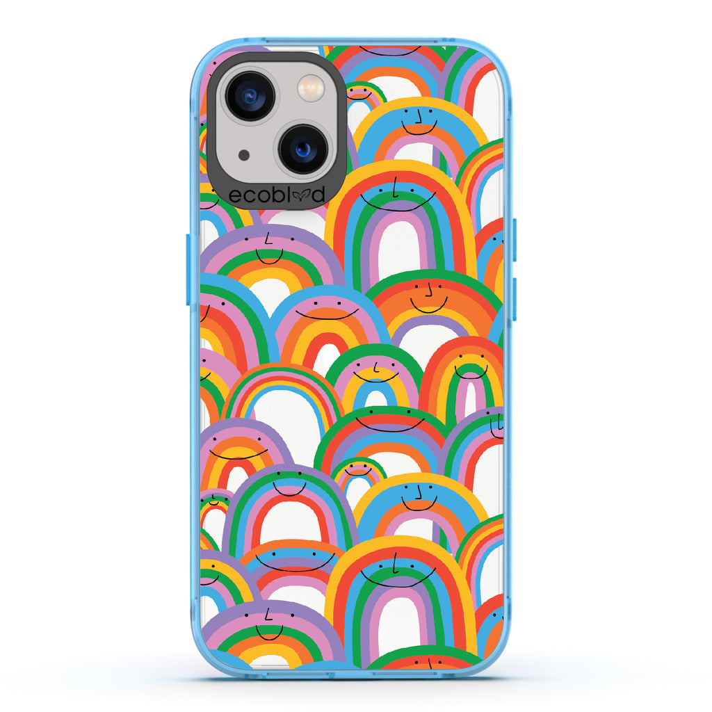 Prideful Smiles - Blue Eco-Friendly iPhone 13 Case With Rainbows That Have Smiley Faces On A Clear Back