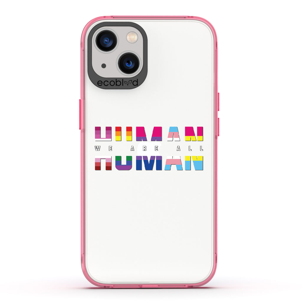 We Are All Human - Pink Eco-Friendly iPhone 13 Case With ?€?We Are All??????+ Human Spelled Out In LGBGTQ+ Flags On A Clear Back