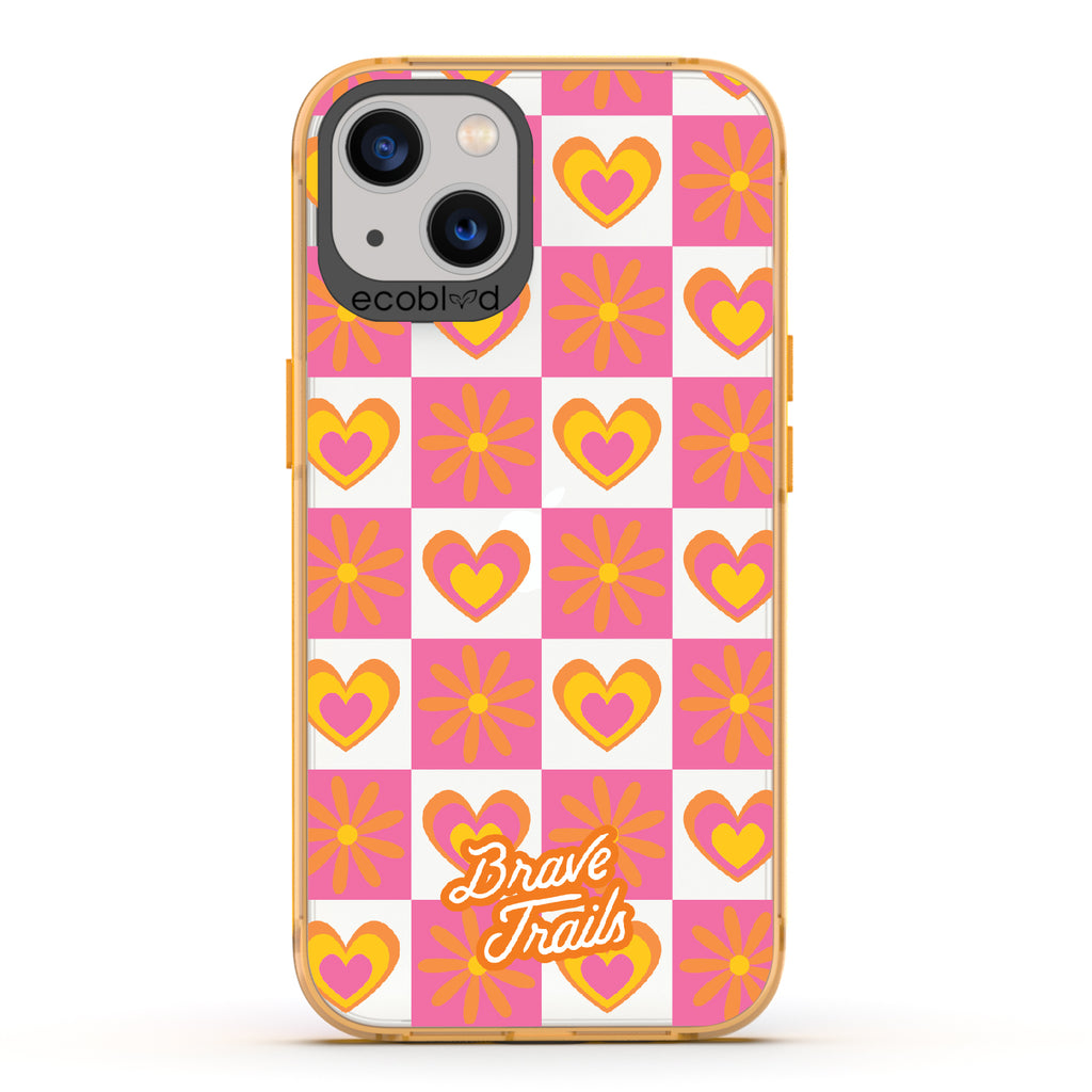 Free Spirit X Brave Trails - Yellow Eco-Friendly iPhone 13 Case with Pink Checkered Hearts & Flowers On Clear Back