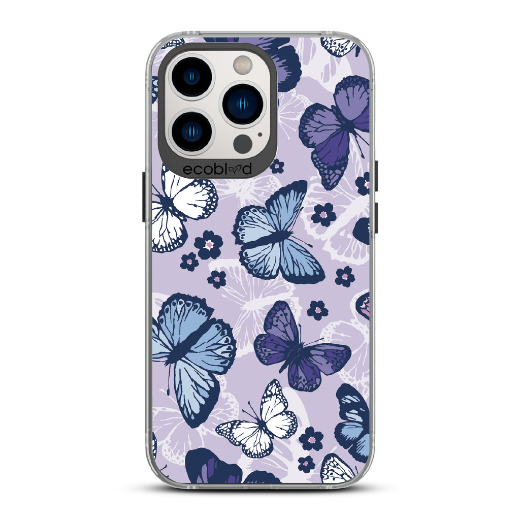 Deja Vu - Black Eco-Friendly iPhone 12/13 Pro Max Case With Blue, White, Purple Butterflies & Flowers On A Purple / Clear Back