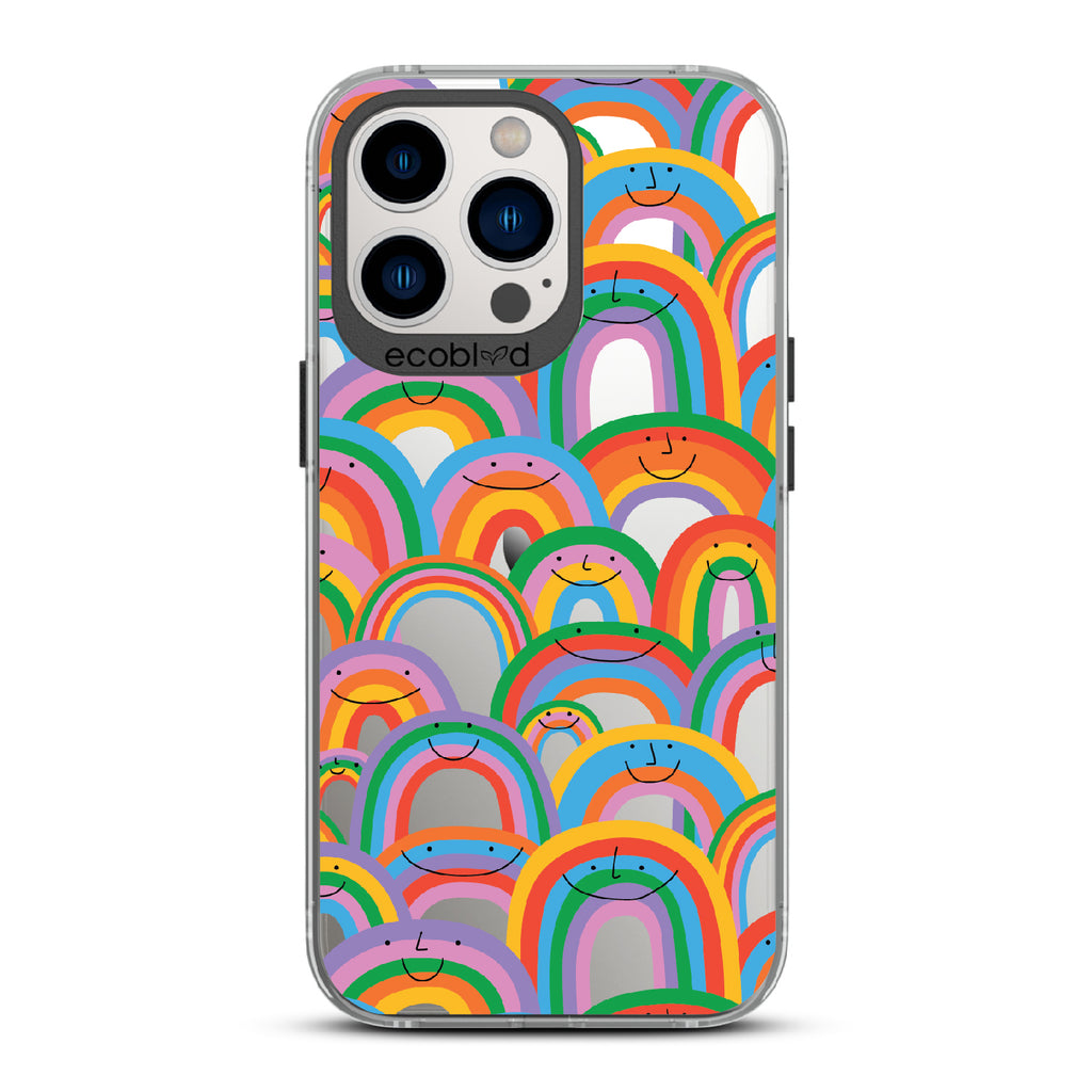 Prideful Smiles - Black Eco-Friendly iPhone 12/13 Pro Max Case With Rainbows That Have Smiley Faces On A Clear Back