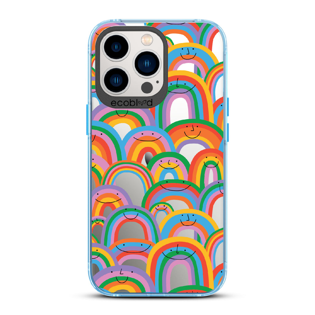 Prideful Smiles - Blue Eco-Friendly iPhone 13 Pro Case With Rainbows That Have Smiley Faces On A Clear Back