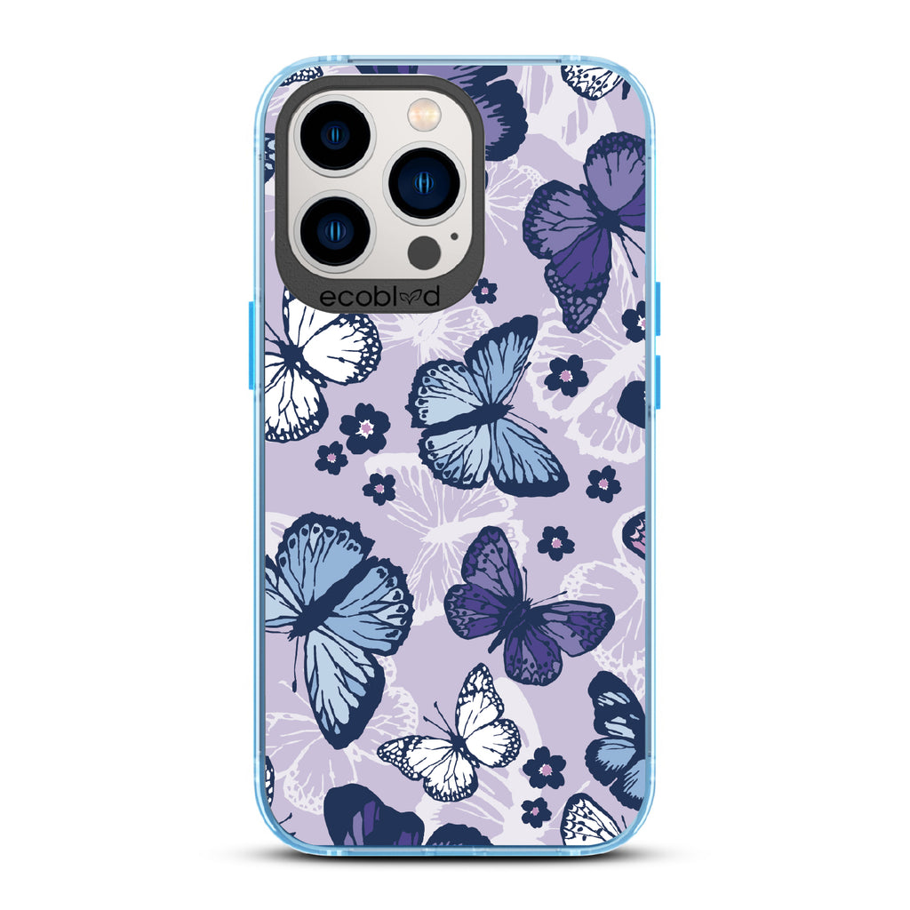 Deja Vu - Blue Eco-Friendly iPhone 13 Pro Case With Blue, White, Purple Butterflies & Flowers On A Purple / Clear Back