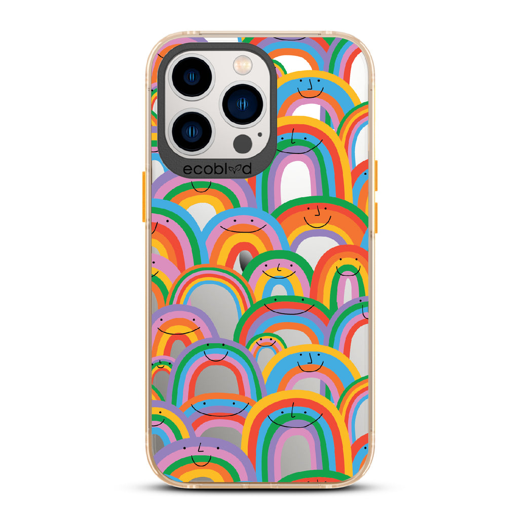 Prideful Smiles - Yellow Eco-Friendly iPhone 12/13 Pro Max Case With Rainbows That Have Smiley Faces On A Clear Back