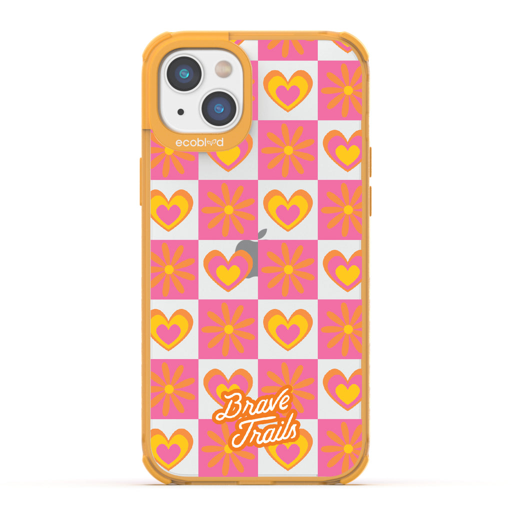 Free Spirit X Brave Trails - Yellow Eco-Friendly iPhone 14 Case with Pink Checkered Hearts & Flowers On Clear Back