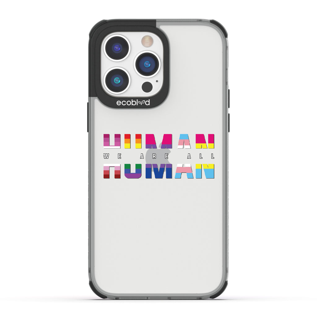 We Are All Human - Black Eco-Friendly iPhone 14 Pro Max Case With ?€?We Are All??????+ Human Spelled Out In LGBGTQ+ Flags On A Clear Back