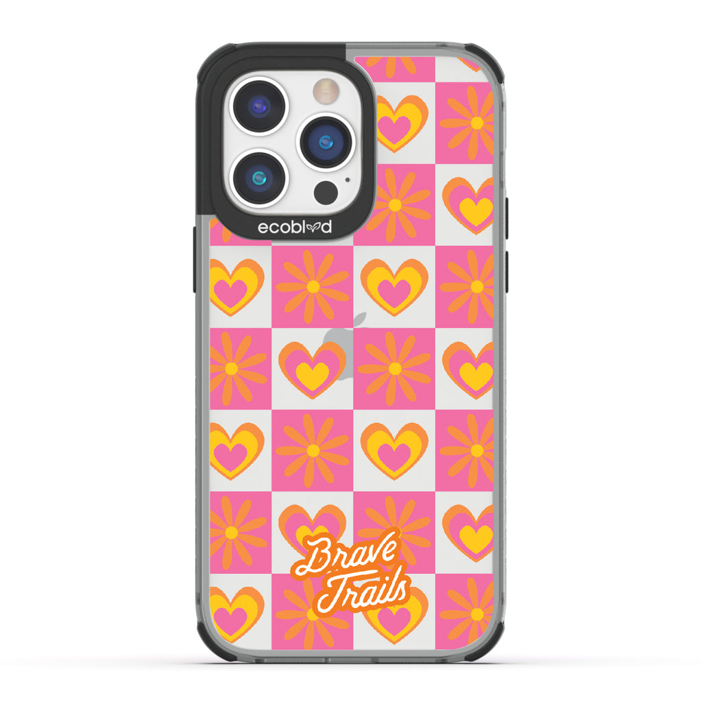 Free Spirit X Brave Trails - Black Eco-Friendly iPhone 14 Pro Max Case with Pink Checkered Hearts & Flowers On Clear Back