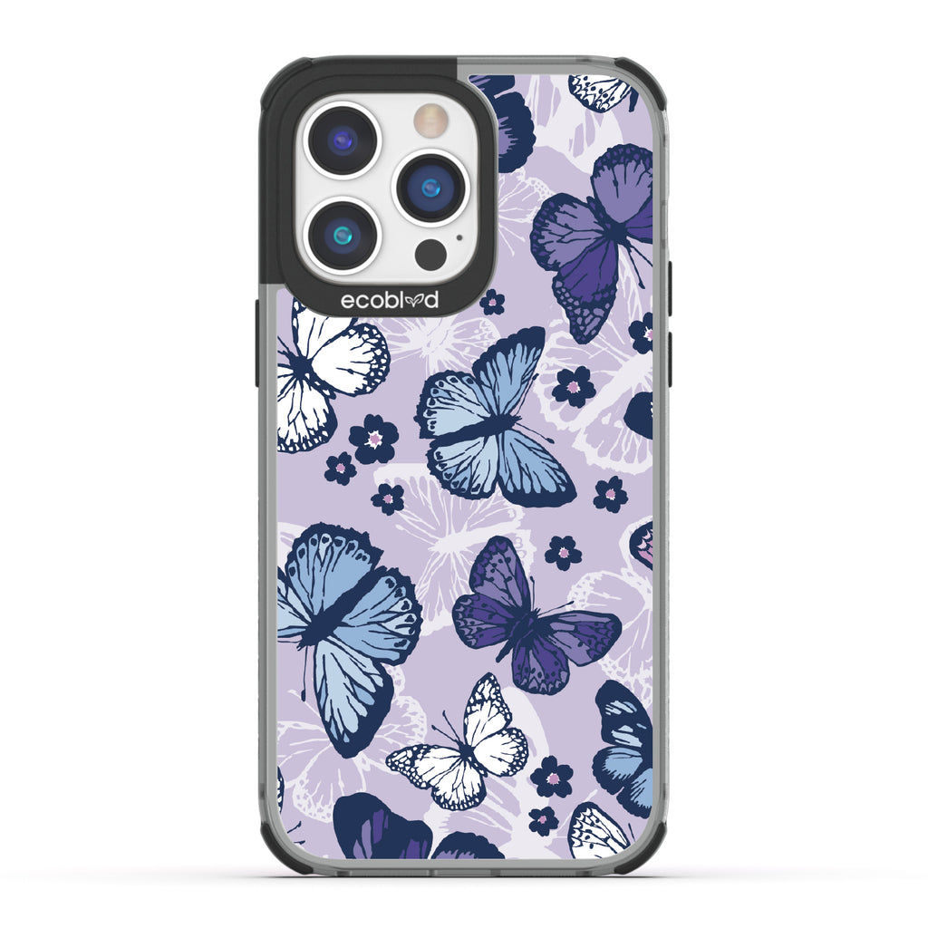 Deja Vu - Black Eco-Friendly iPhone 14 Pro Max Case With Blue, White, Purple Butterflies & Flowers On A Purple / Clear Back