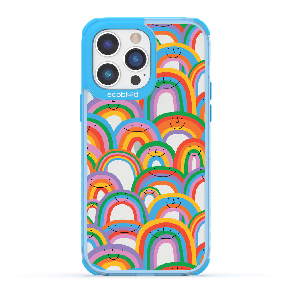 Prideful Smiles - Blue Eco-Friendly iPhone 14 Pro Max Case With Rainbows That Have Smiley Faces On A Clear Back