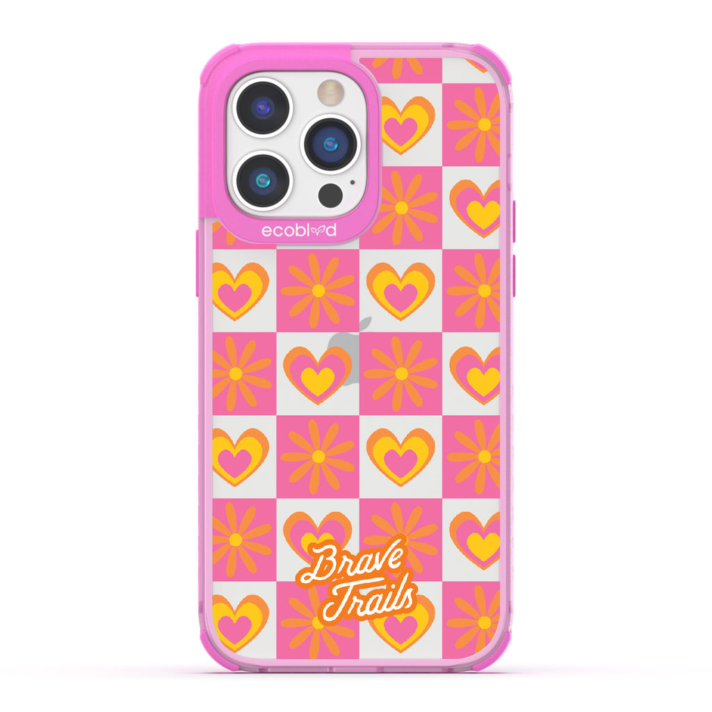 Free Spirit X Brave Trails - Pink Eco-Friendly iPhone 14 Pro Case with Pink Checkered Hearts & Flowers On Clear Back