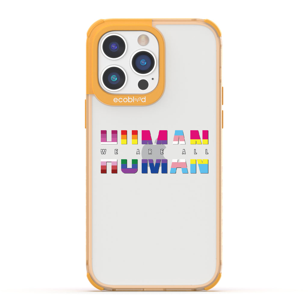 We Are All Human - Yellow Eco-Friendly iPhone 14 Pro Max Case With “We Are All” + Human Spelled Out In LGBGTQ+ Flags On A Clear Back