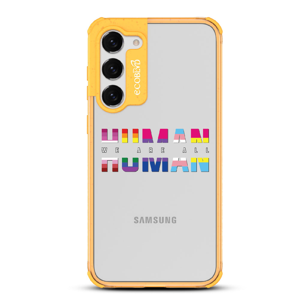 We Are All Human - Yellow Eco-Friendly Galaxy S23 Case With ?€?We Are All??????+ Human Spelled Out In LGBGTQ+ Flags On A Clear Back