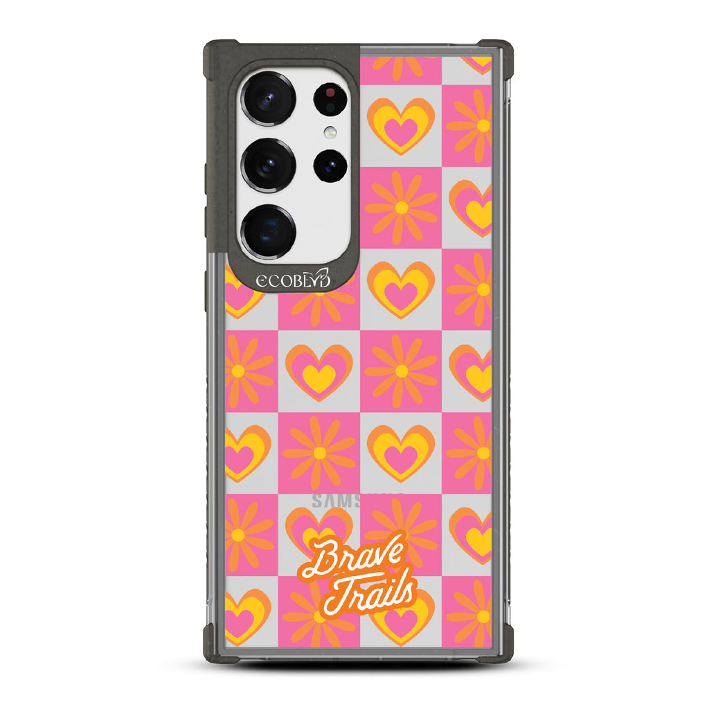 Free Spirit X Brave Trails - Black Eco-Friendly Galaxy S23 Ultra Case with Pink Checkered Hearts & Flowers On Clear Back