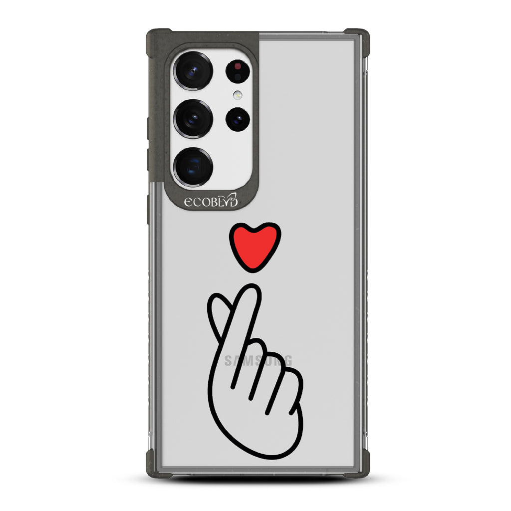 Finger Heart - Black Eco-Friendly Galaxy S23 Ultra Case With Red Heart Above Finger Heart Gesture On A Clear Back