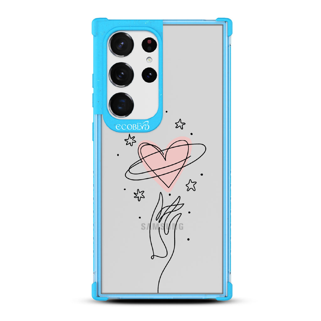 Be Still My Heart - Blue Eco-Friendly Galaxy S23 Ultra Case with Hand Reaching For Pink Heart On A Clear Back