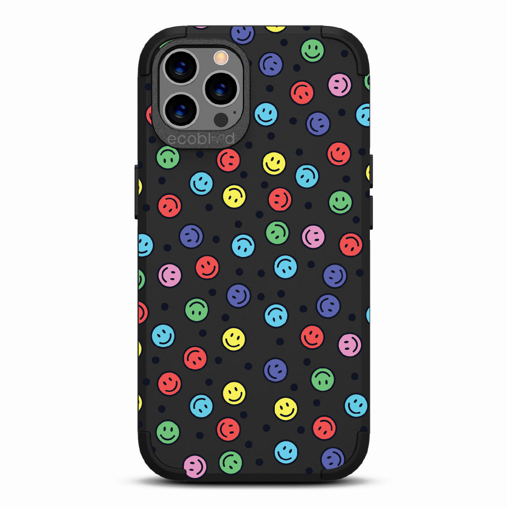 All Smiles - Black Rugged Eco-Friendly iPhone 12/12 Pro Case With Multicolored Smiley Faces & Black Dots On Back