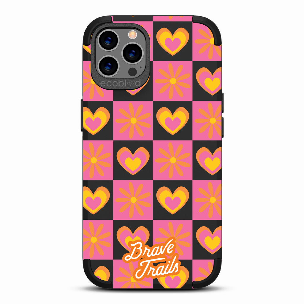 Free Spirit X Brave Trails - Black Rugged Eco-Friendly iPhone 12/12 Pro Case With Pink Checkered Hearts & Flowers