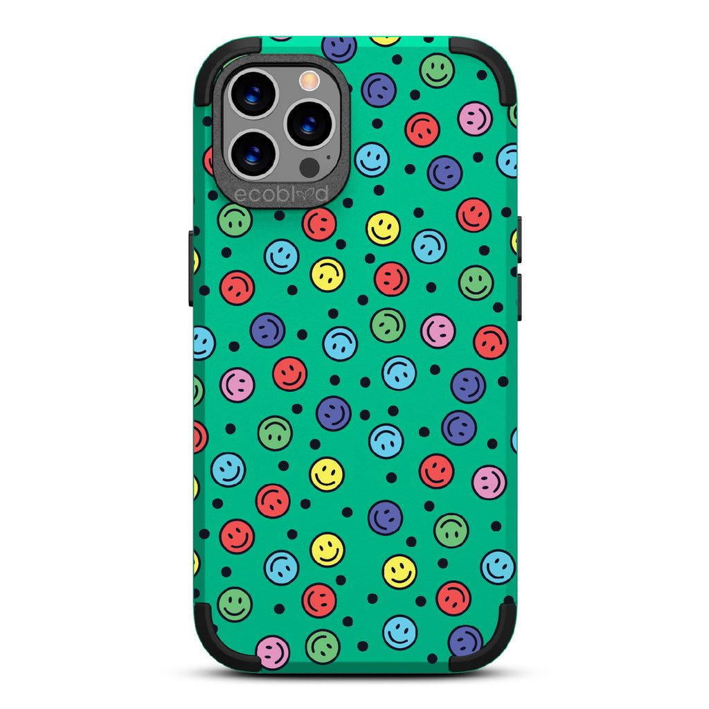 All Smiles - Green Rugged Eco-Friendly iPhone 12/12 Pro Case With Multicolored Smiley Faces & Black Dots On Back