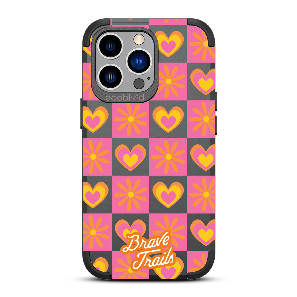Free Spirit X Brave Trails - Black Rugged Eco-Friendly iPhone 13 Pro Case With Pink Checkered Hearts & Flowers