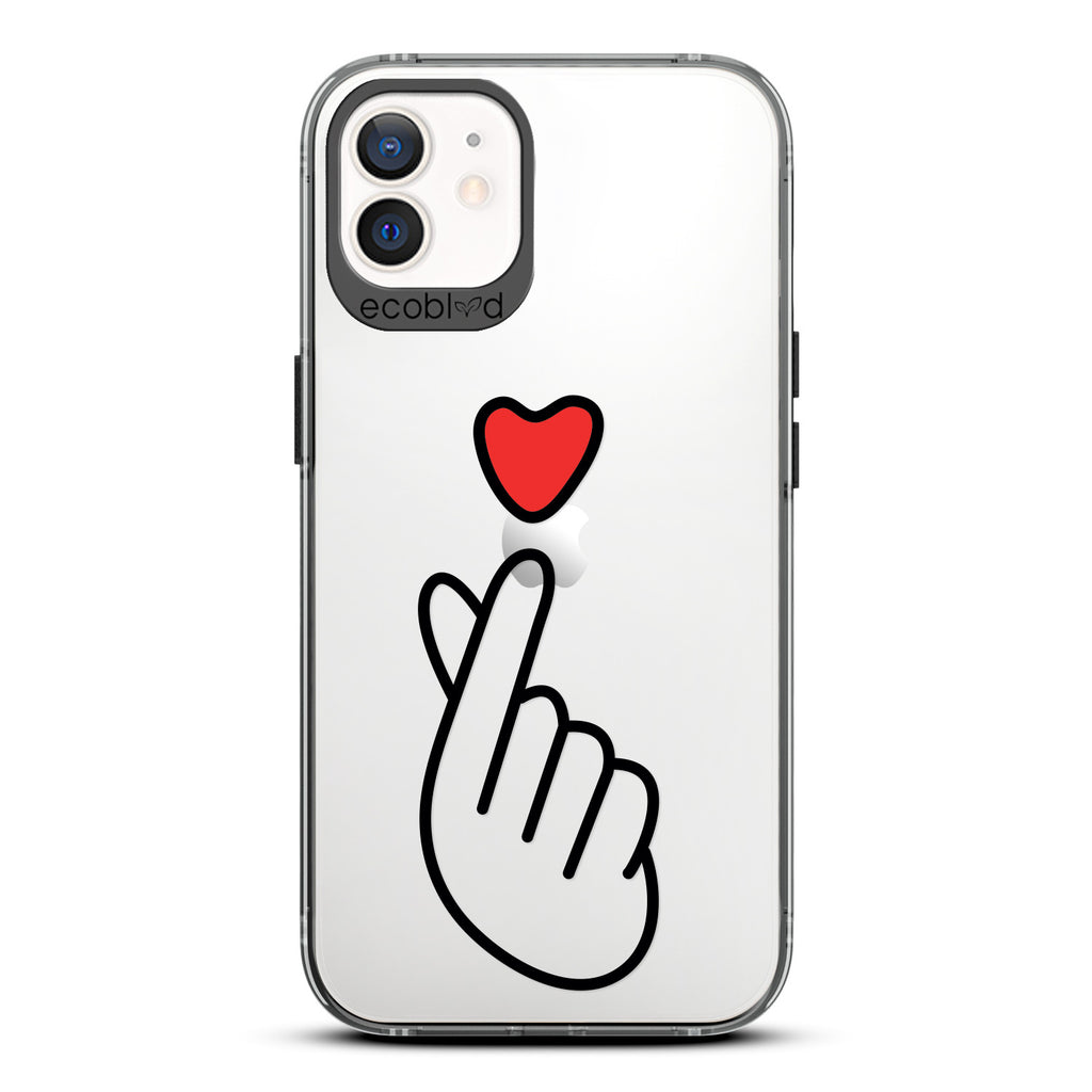 Love Collection - Black iPhone 12 / 12 Pro Case - Red Heart Above Hand With Index Finger & Thumb Crossed On Clear Back