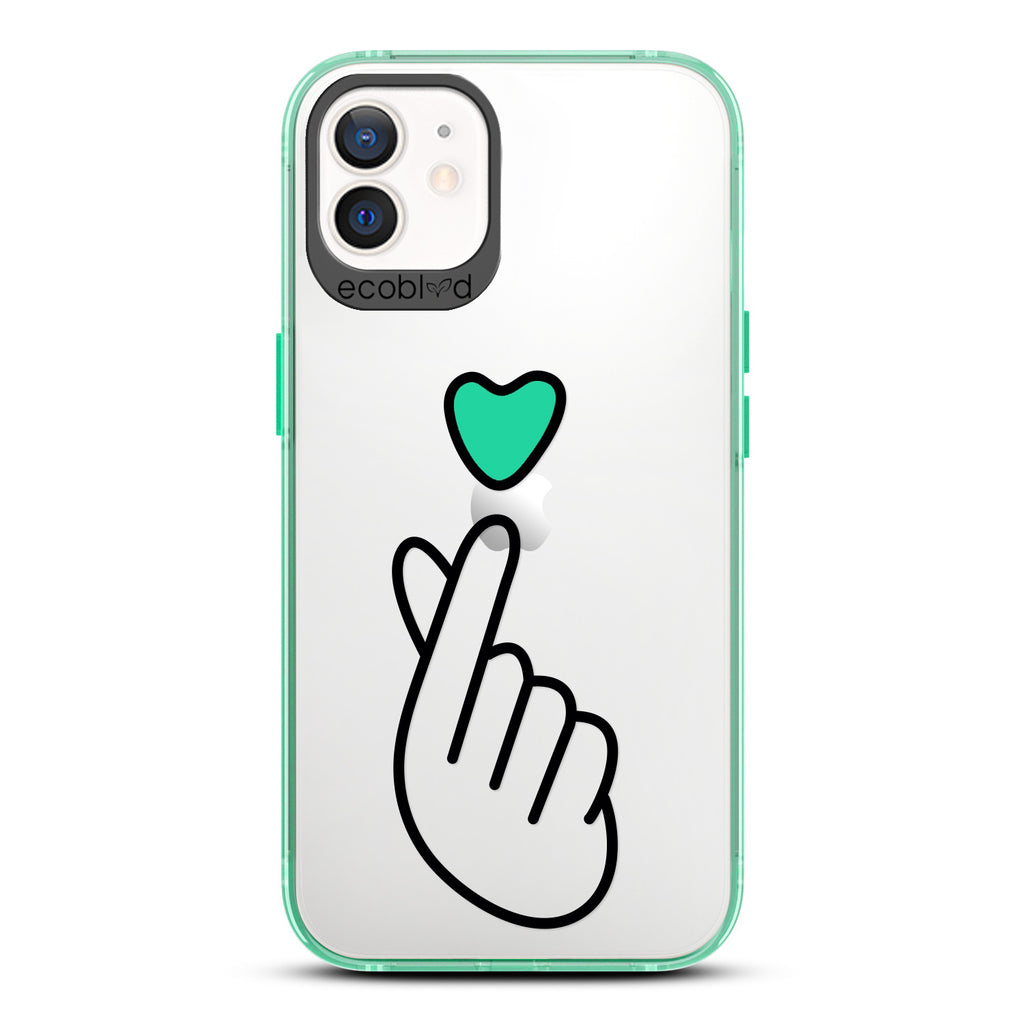 Love Collection - Green iPhone 12 / 12 Pro Case - Green Heart Above Hand With Index Finger & Thumb Crossed On Clear Back