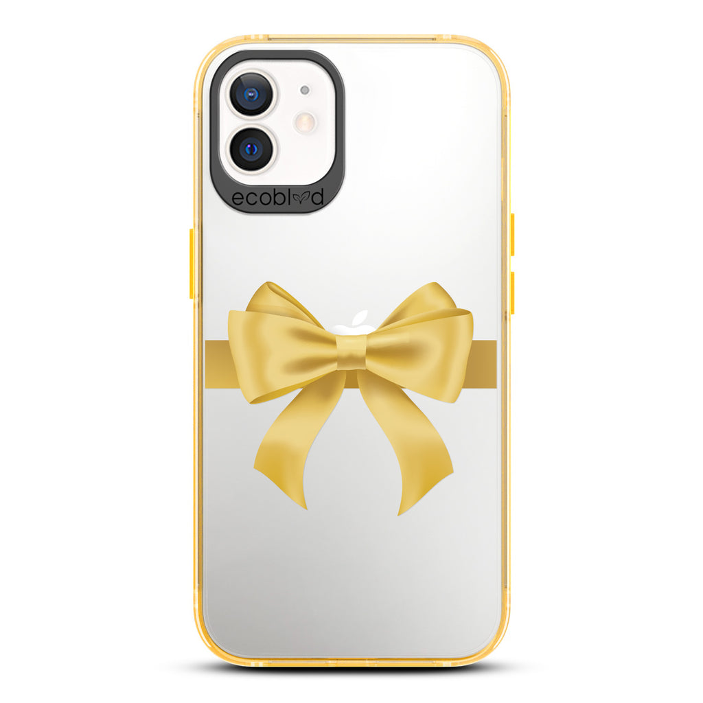 Winter Collection - Yellow Eco-Friendly Laguna iPhone 12 / 12 Pro Case With A Yellow Gift Bow Printed On A Clear Back