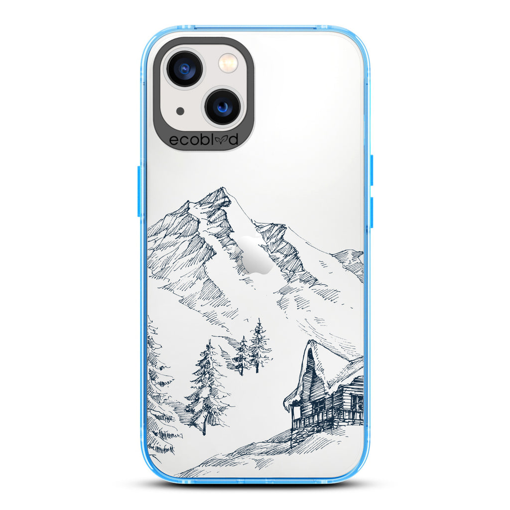 Winter Collection - Blue Compostable iPhone 13 Case - Snowy Mountainside Wood Cabin On A Clear Back