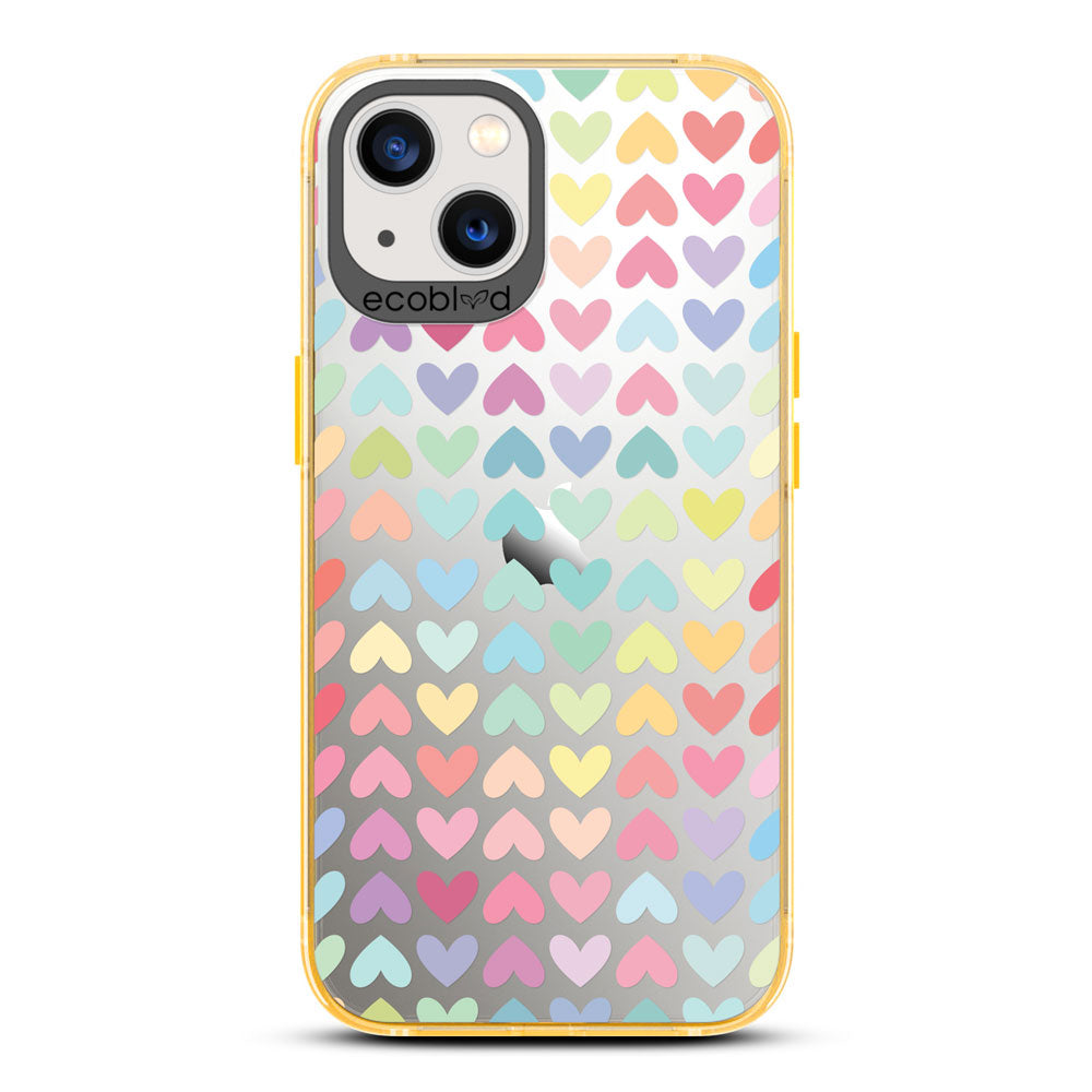 Laguna Collection - Yellow Eco-Friendly iPhone 13 Case With A Pastel Rainbow Hearts Pattern On A Clear Back
