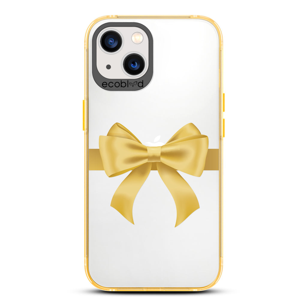 Winter Collection - Yellow Eco-Friendly Laguna iPhone 13 Case With A Yellow Gift Bow Printed On A Clear Back