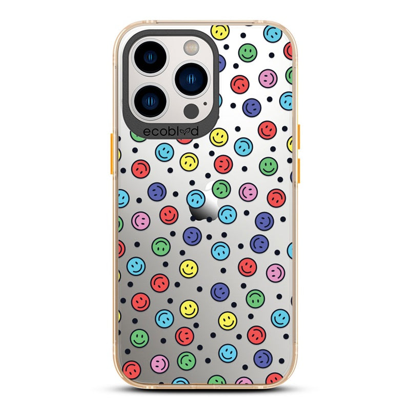 Laguna Collection - Yellow Eco-Friendly iPhone 13 Pro Case With Multicolored Smiley Faces & Black Dots On A Clear Back 