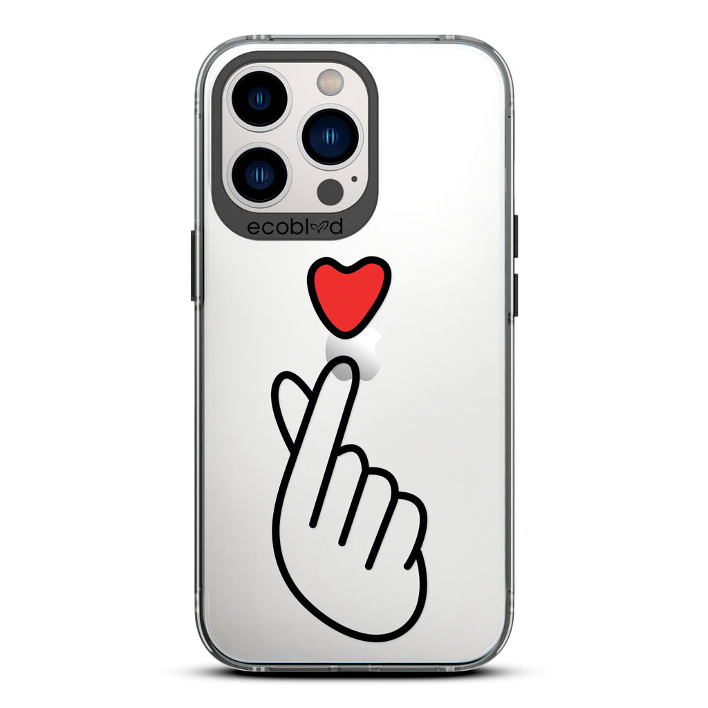 Love Collection - Black iPhone 13 Pro Case - Red Heart Above Hand With Index Finger & Thumb Crossed On A Clear Back