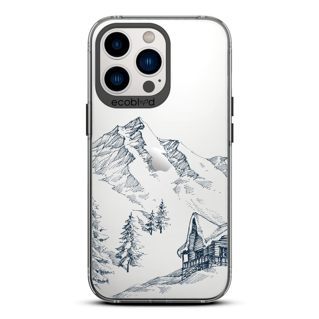 Winter Collection - Black Compostable iPhone 13 Pro Case - Snowy Mountainside Wood Cabin On A Clear Back