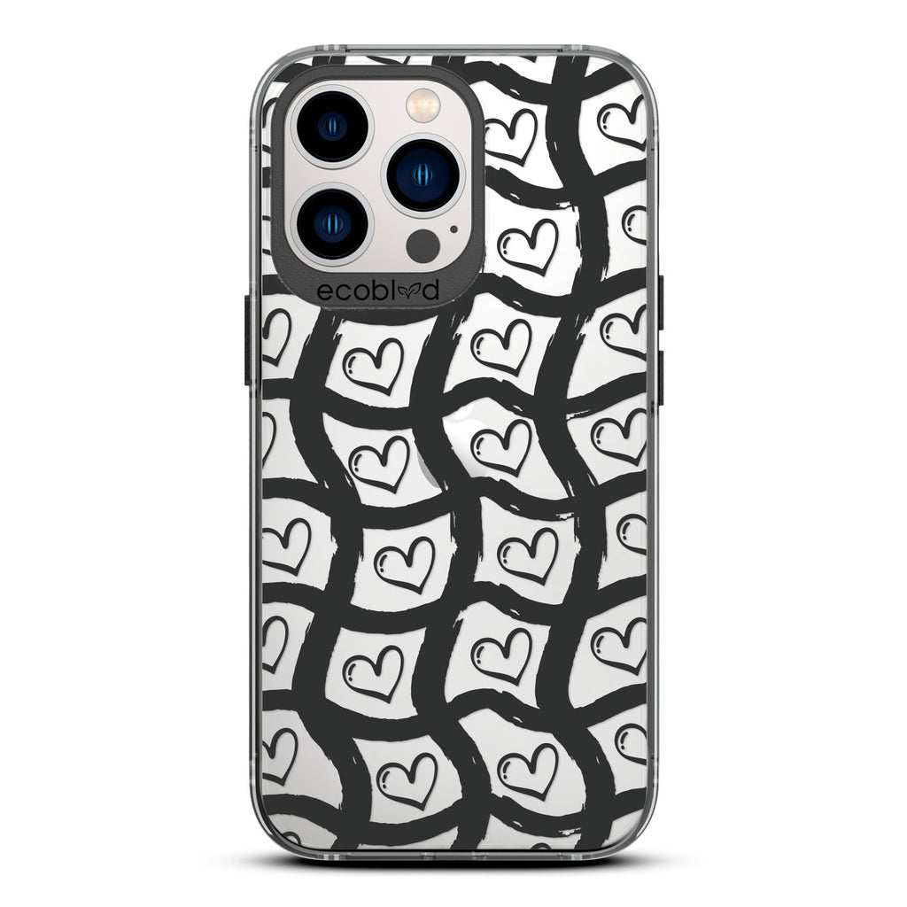 Love Collection - Black Compostable iPhone 13 Pro Case - Wavy Paint Stroke Checker Print With Hearts On A Clear Back