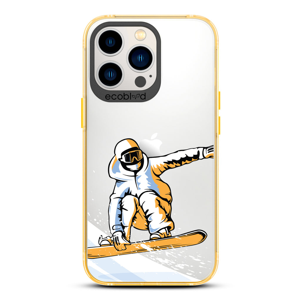 Winter Collection - Yellow Eco-Friendly iPhone 12 & 13 Pro Max Case - A Snowboarder Jumps Holding The Board On A Clear Back