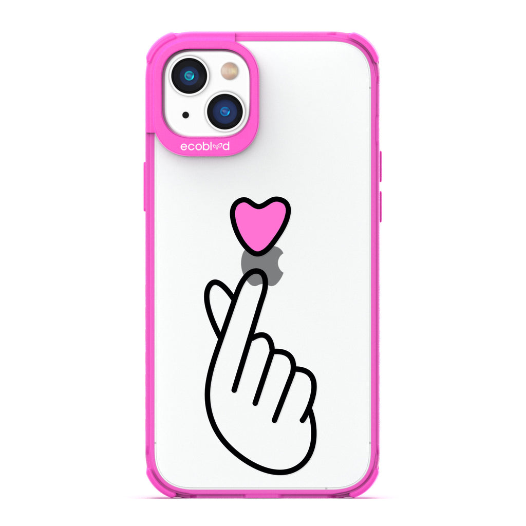 Love Collection - Pink iPhone 14 Case - Pink Heart Above Hand With Index Finger & Thumb Crossed On Clear Back