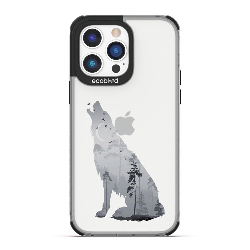 Laguna Collection - Black Eco-Friendly iPhone 14 Pro Case With A Howling Wolf And Moonlit Woodlands Print On A Clear Back