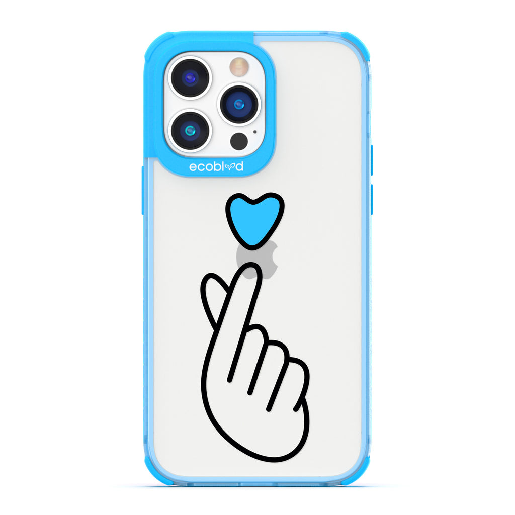 Love Collection - Blue iPhone 14 Pro Max Case - Blue Heart Above Hand With Index Finger & Thumb Crossed On Clear Back