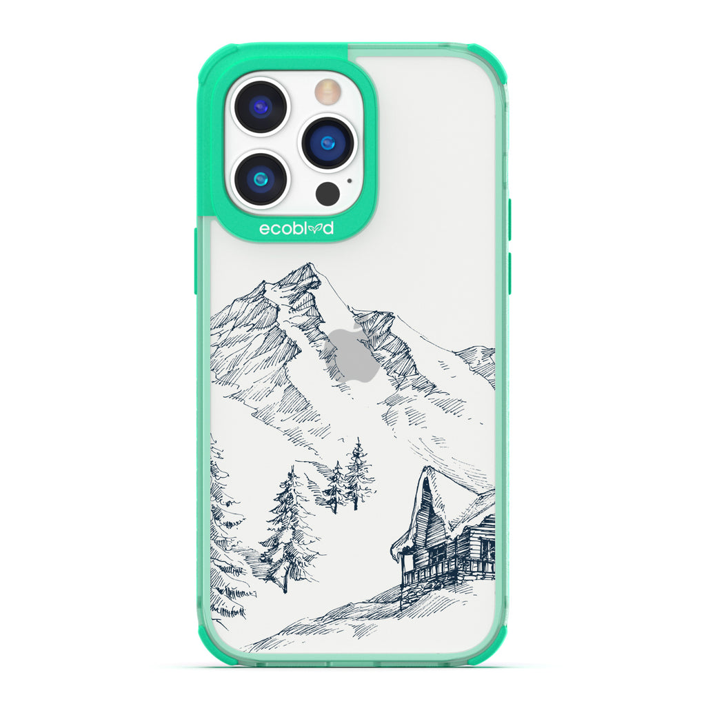Winter Collection - Green Compostable iPhone 14 Pro Case - Snowy Mountainside Wood Cabin On A Clear Back