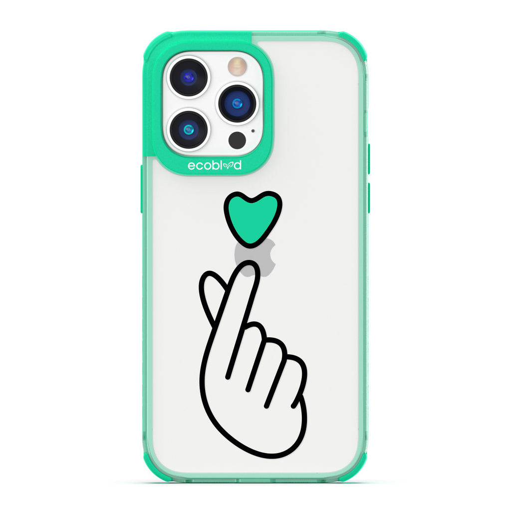 Love Collection - Green iPhone 14 Pro Max Case - Green Heart Above Hand With Index Finger & Thumb Crossed On Clear Back
